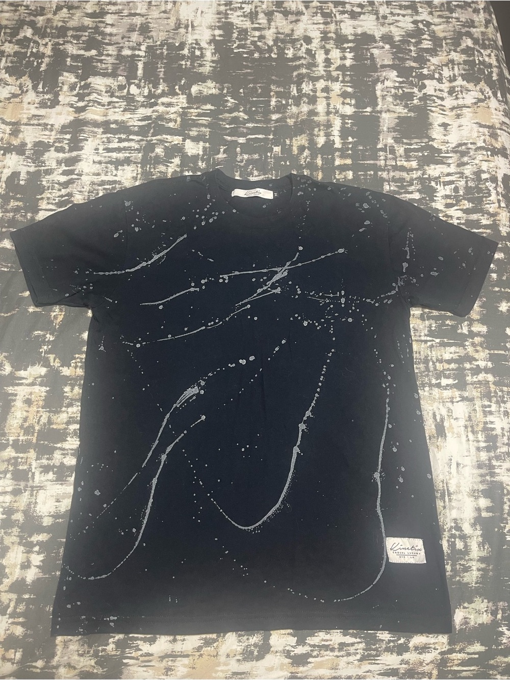 Kinetix Black Crewneck Tee with Gray Paint-Splash Detail